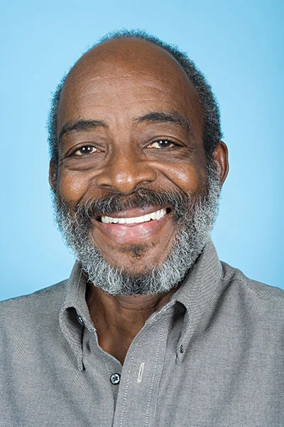 man smiling with all-on-5 dental implants from Acre Wood Dental - Temple