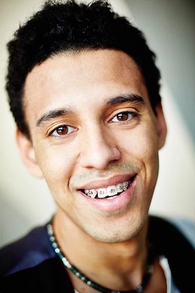 man smiling with braces from Acre Wood Dental - Temple