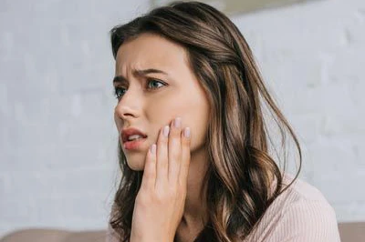 woman needing an emergency dentist in Temple, TX