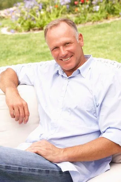 man with dentures smiling