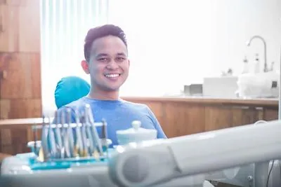 man receiving periodontal care at Acre Wood Dental in Waco, TX