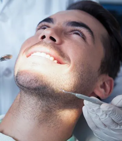 man getting dental crowns in Waco, TX